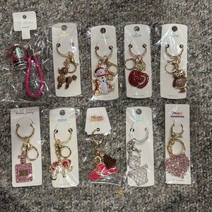 Resellers lot of 10 rhinestone keychains/bag charms. Great variety all new.